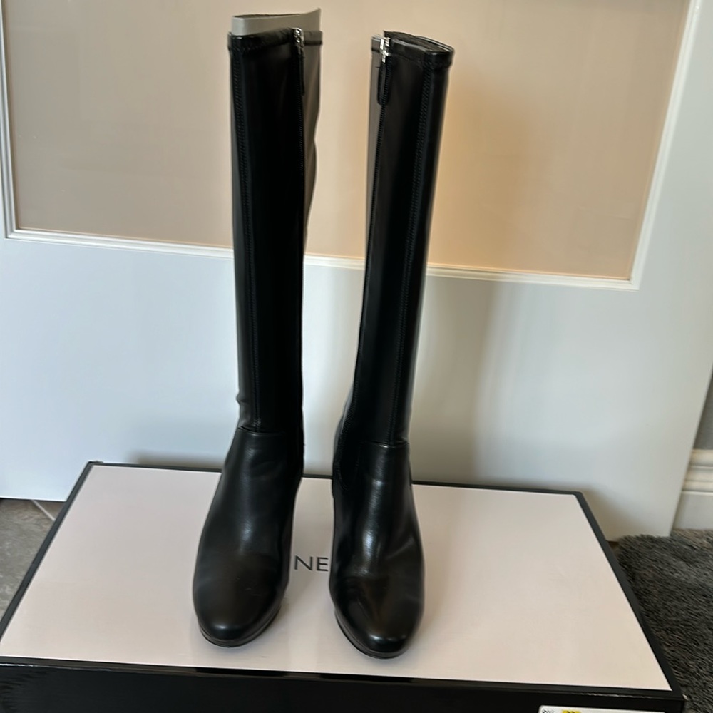 Nine West knee-high boots with 3 1/2” heels.